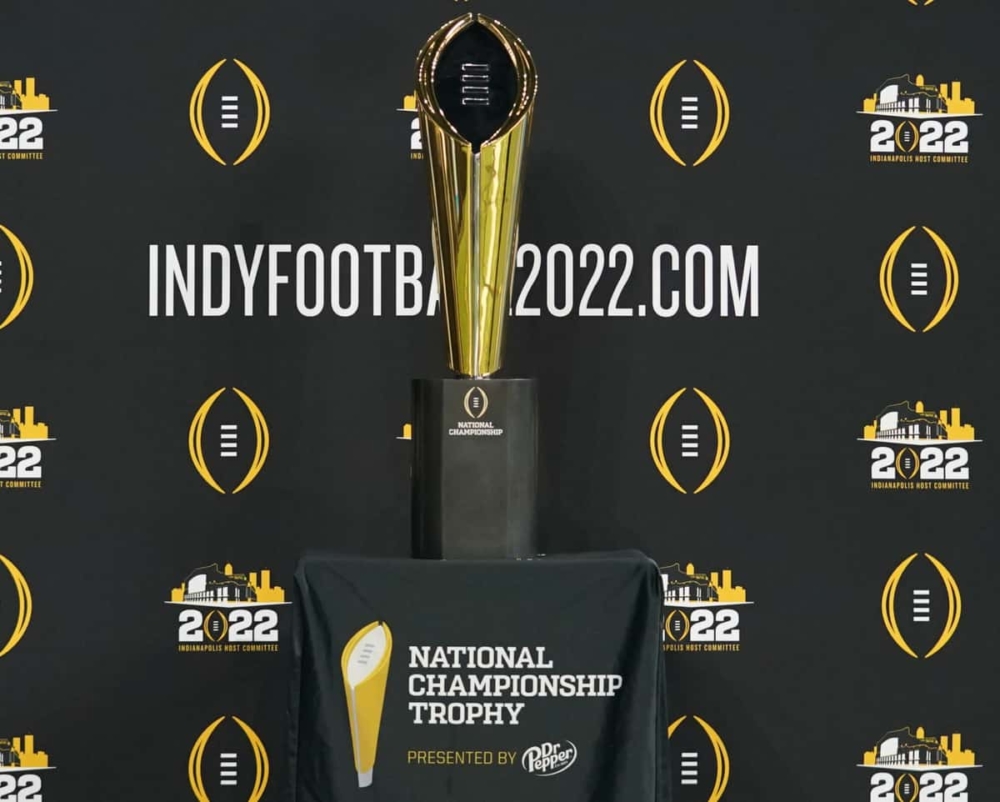 Jul 22, 2021; Indianapolis, Indiana, USA;  The College Football Playoff national championship trophy is displayed during Big 10 media days at Lucas Oil Stadium. Mandatory Credit: Robert Goddin-USA TODAY Sports
